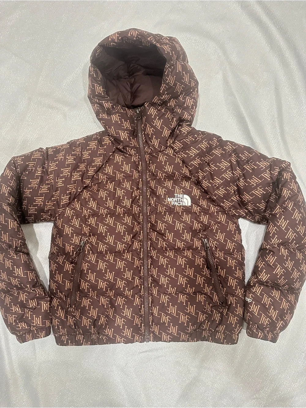 The North Face Brown Monogram Puff Jacket “TNF”